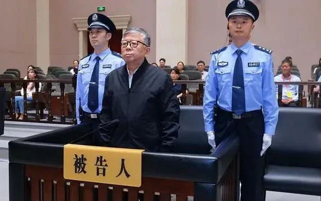 China sentences official to death over bribes