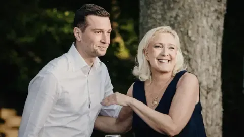 Marine Le Pen found guilty, but court clears way for presidential run if she wears tag