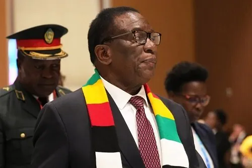 Zimbabwe president signs law to delay elections, extend his own term