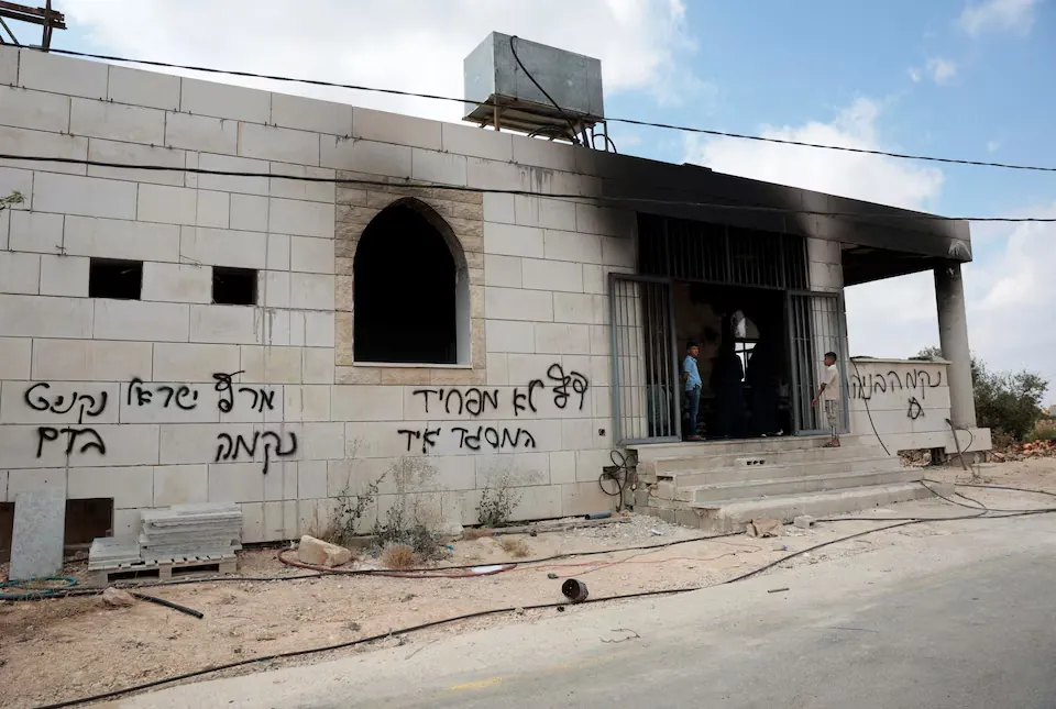 Israeli settlers set fire to West Bank mosques after deadly clash