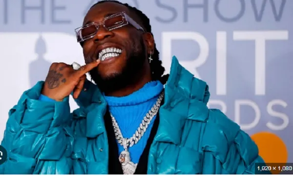 Burna Boy flaunts Ghana flag during performance at Afro Nation Festival