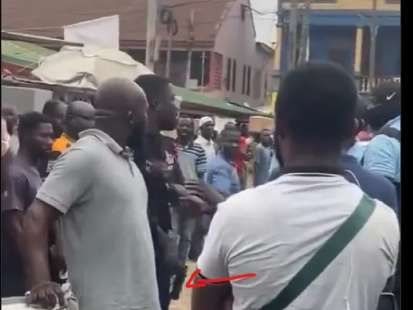Watch as police officer cocks gun at KMA official during alleged disagreement