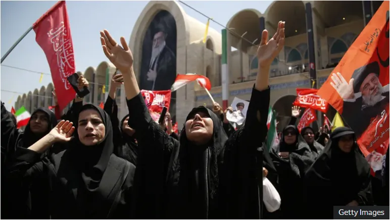 Iran’s supreme leader absent as senior officials attend ayatollah’s funeral