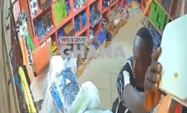 Watch CCTV footage of how a suspected thief removed a shop's Wi-Fi router