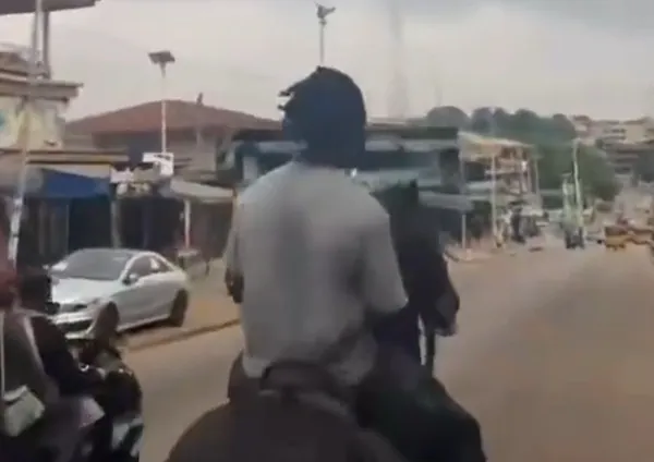 Watch as Black Stars defender Alidu Seidu rides horse through the streets of Kumasi